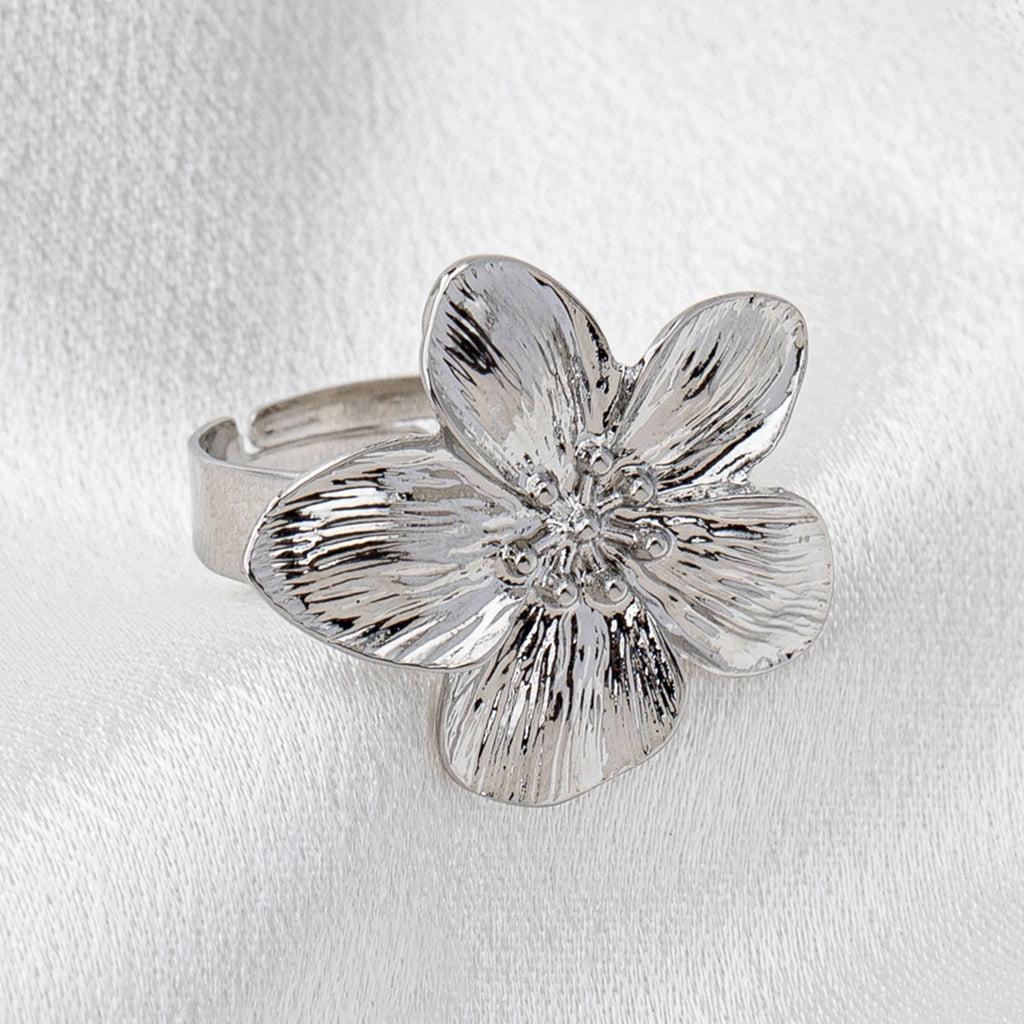A Women's Ring with a Flower Design, Made of Metal and Adjustable in Size, Suitable for Everyday Wear and Holidays