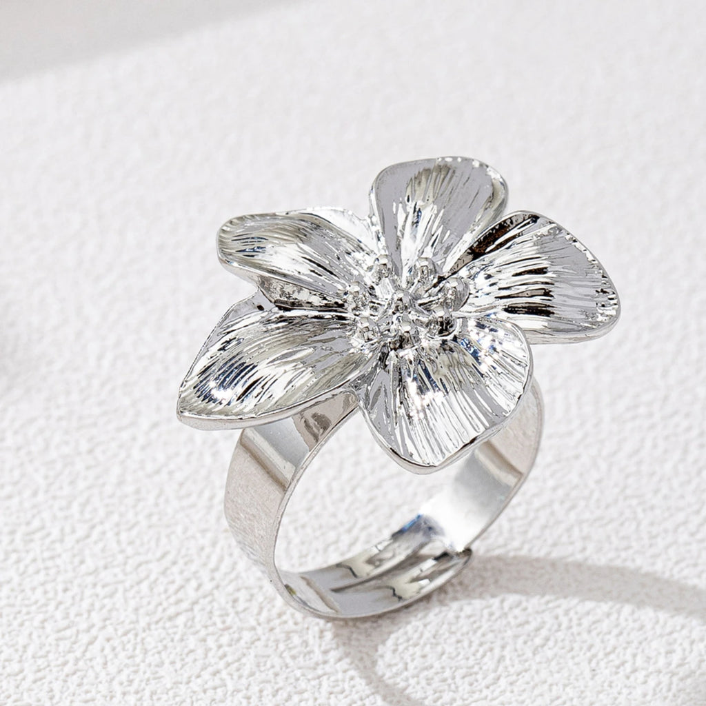 A Women's Ring with a Flower Design, Made of Metal and Adjustable in Size, Suitable for Everyday Wear and Holidays