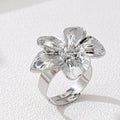 A Women's Ring with a Flower Design, Made of Metal and Adjustable in Size, Suitable for Everyday Wear and Holidays