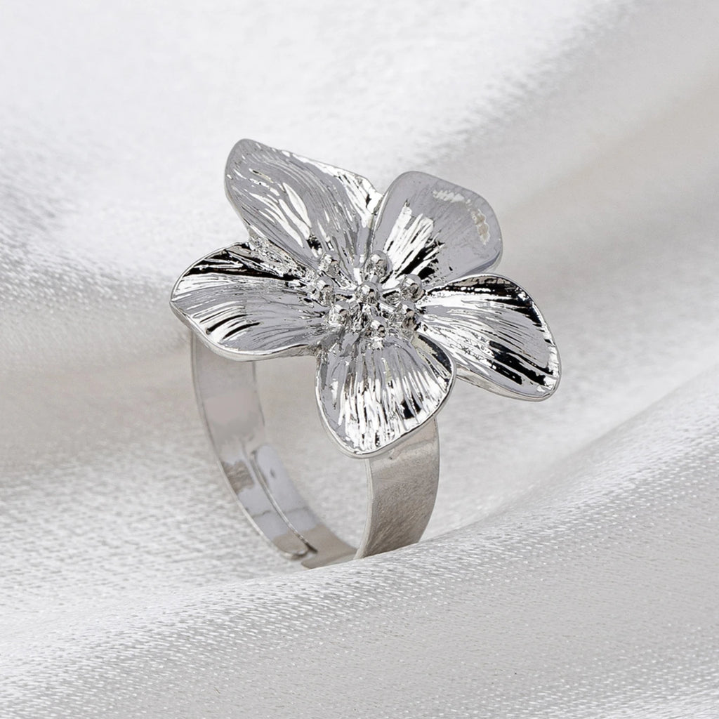 A Women's Ring with a Flower Design, Made of Metal and Adjustable in Size, Suitable for Everyday Wear and Holidays