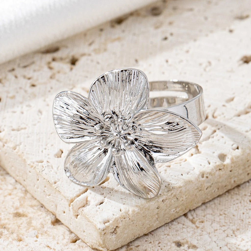 A Women's Ring with a Flower Design, Made of Metal and Adjustable in Size, Suitable for Everyday Wear and Holidays